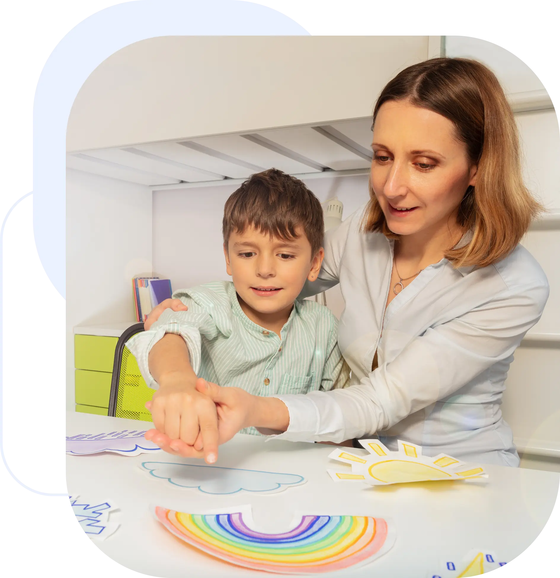Woman and child doing an art project.